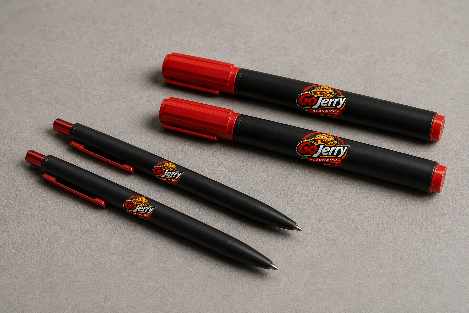 Black and red GoJerry branded pens and markers